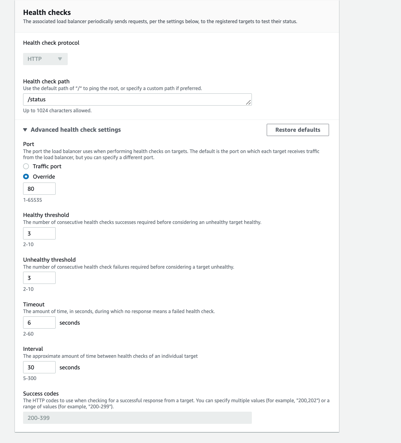 Target group health check configured for HTTP /status on port 80